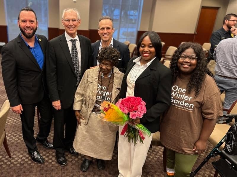Austin Arthur with one Winter Garden leaders and neighbors at the table